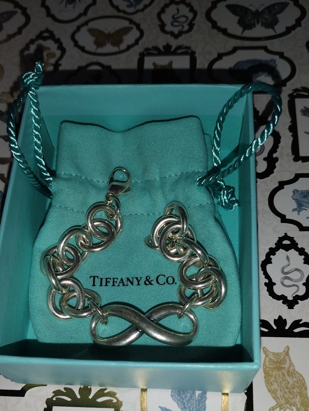 Tiffany & Co. Silver Infinity Link Bracelet with Aqua Pouch